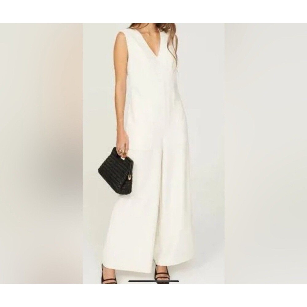 Free People Beach Oversized Cream Cotton Jumpsuit Size XS Wide Leg Pockets Flaw